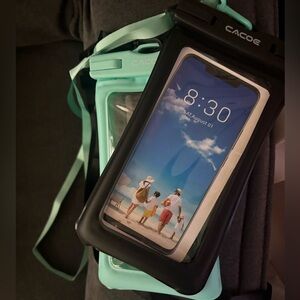 Two waterproof phone cases w/ straps